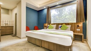 Deluxe Room | Desk, iron/ironing board (on request), WiFi (free), bed sheets - Treebo Mall View, DLF Phase II (Gurugram)