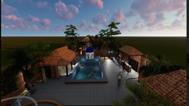Zona de piscina con tobogán de agua, rodeada de construcciones con techo de paja y palmeras.