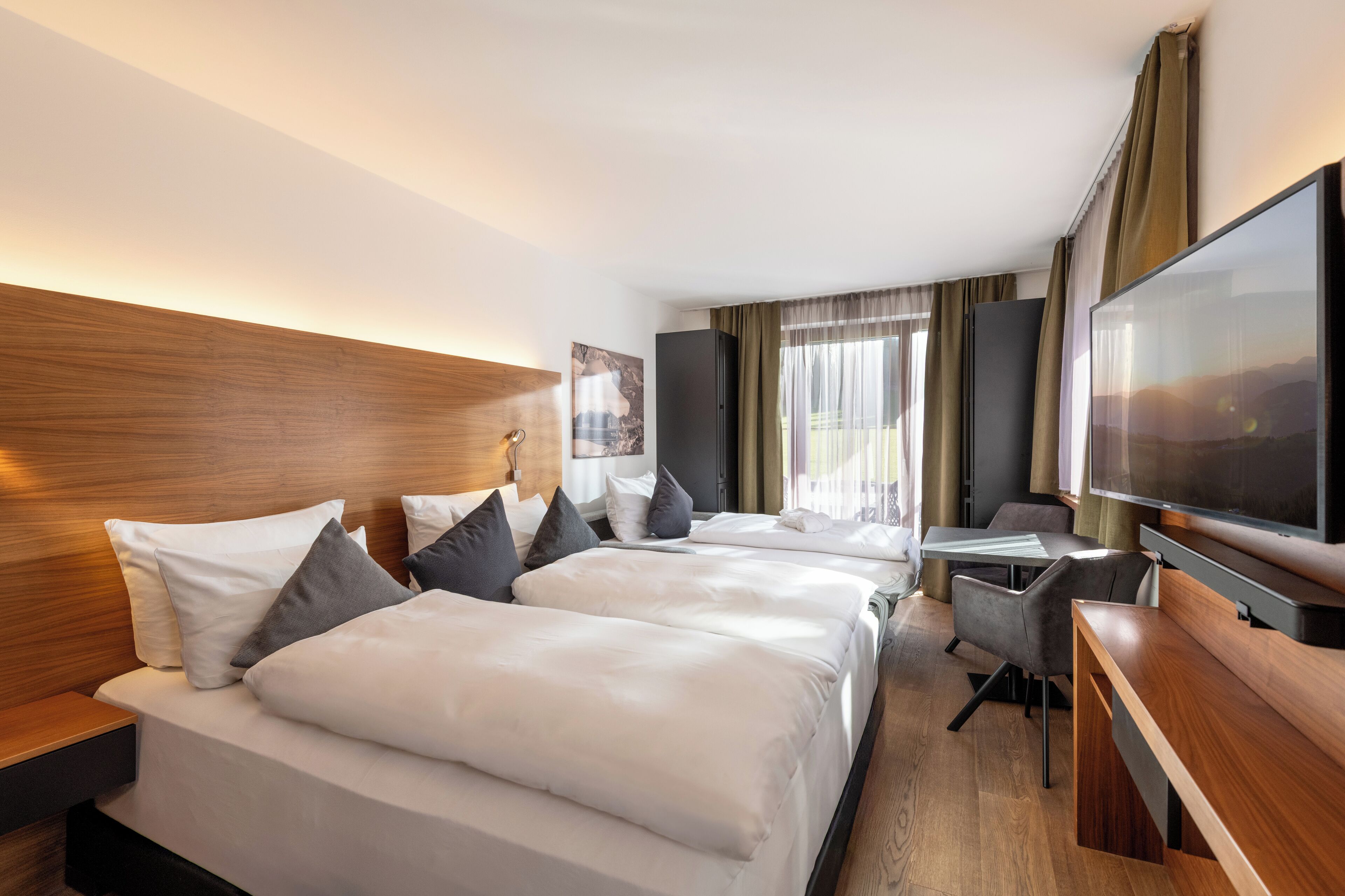 Premium bedding, down comforters, in-room safe, desk