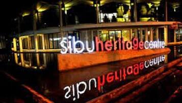 A boat with the text "Sibu Heritage Centre" on its side.