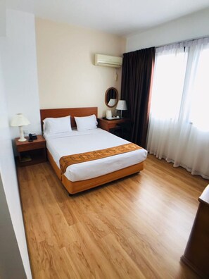 Standard Double or Twin Room, Non Smoking | Desk, blackout drapes, iron/ironing board, bed sheets