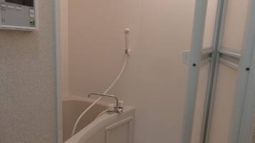 Shower, free toiletries, hair dryer, slippers