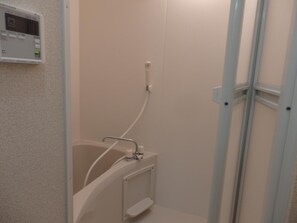 Shower, free toiletries, hair dryer, slippers