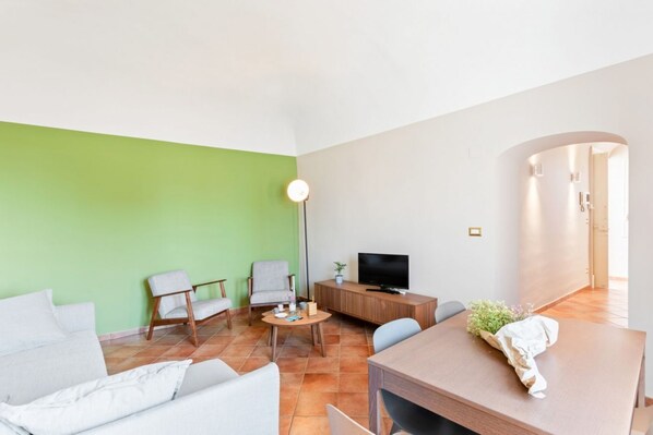 Living area - GuestHost - This comfortable 75sqm apartment can accommodate up to 4 people. Located on the third floor (without elevator) of a characteristic building inside the city center Restricted Traffic Area, few steps away from San Giuliano Curch.Ideally located (Catania)