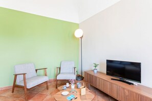 Living area - GuestHost - This comfortable 75sqm apartment can accommodate up to 4 people. Located on the third floor (without elevator) of a characteristic building inside the city center Restricted Traffic Area, few steps away from San Giuliano Curch.Ideally located (Catania)