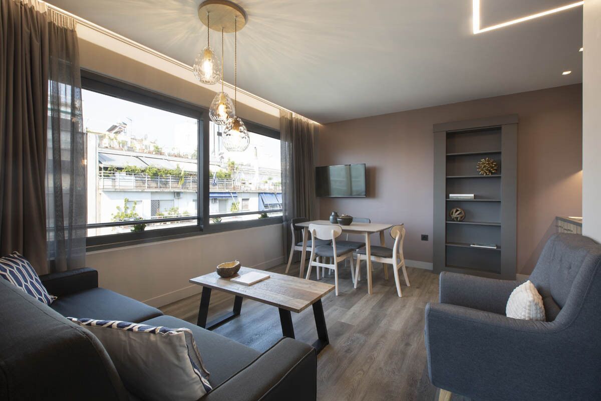 Apartamento, 1 quarto (Street View) | Área de estar | TV de tela plana