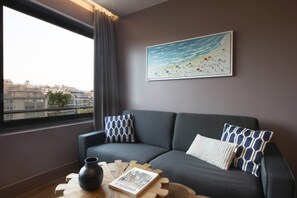Apartment, 1 Bedroom (Avenue View) | Living room | Flat-screen TV - City Lights Athens (Athens)