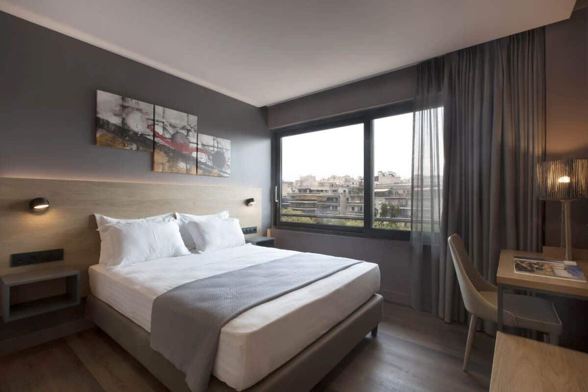 Apartment, 1 Bedroom (Avenue View) | In-room safe, desk, laptop workspace, blackout drapes