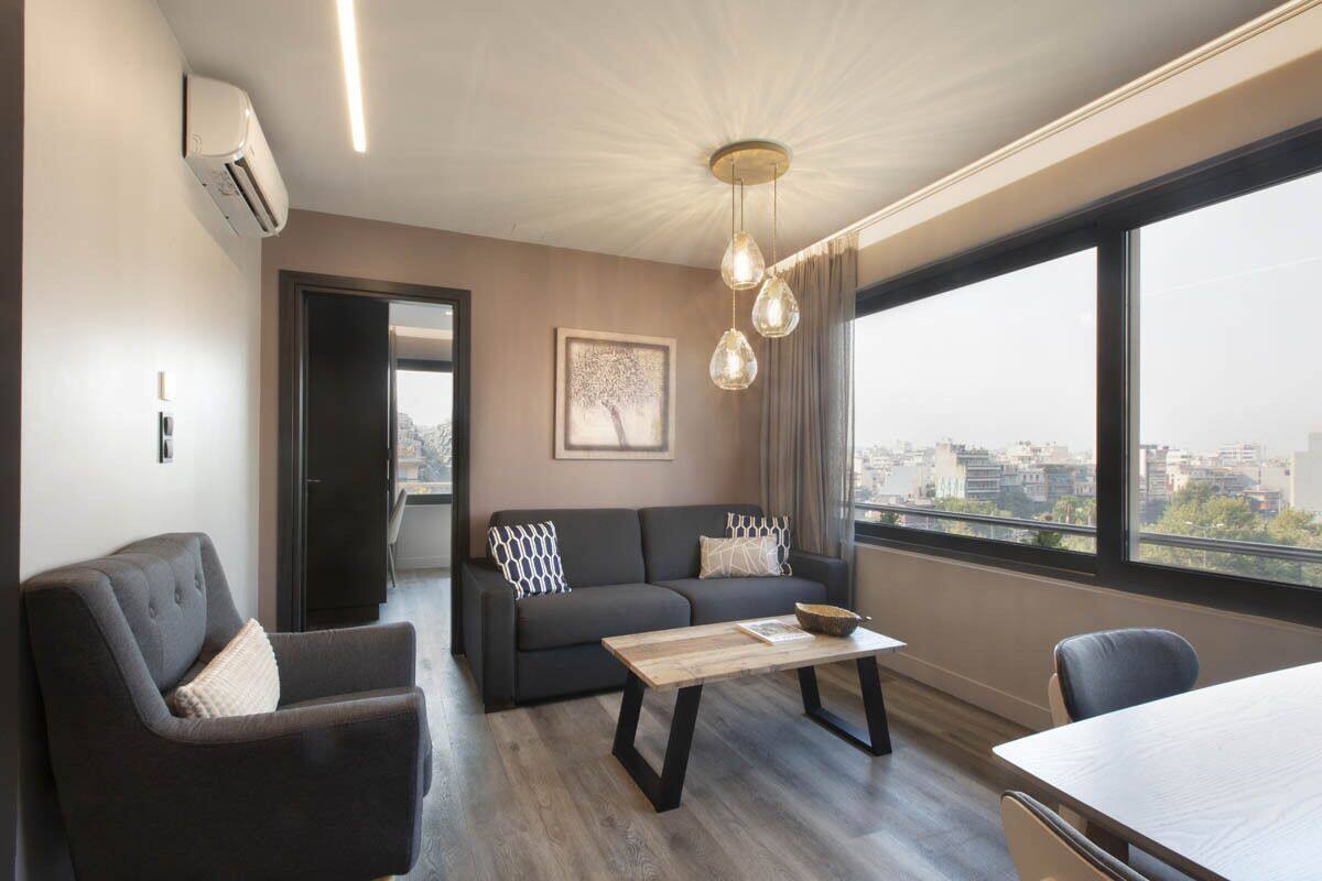 Apartment, 1 Bedroom (Street View) | Living area | Flat-screen TV