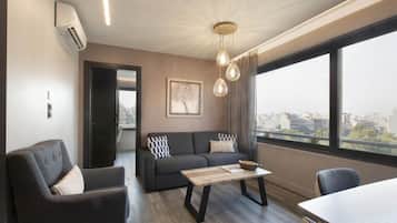 Apartment, 1 Bedroom (Street View) | Living area | Flat-screen TV