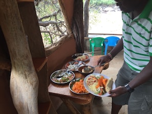 Breakfast, lunch, dinner served; local and international cuisine