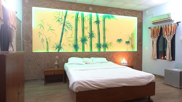 Deluxe Room, Lake View (AC) | Memory foam beds, minibar, individually decorated