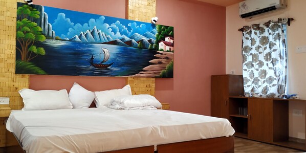 Deluxe Room, Lake View (AC) | 1 bedroom, memory foam beds, minibar, individually decorated