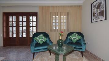 Suite superior | 1 dormitorio, mobiliario individual, cortinas opacas