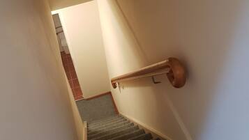 Quadruple Room, 2 Bedrooms, Garden View | Living area | Flat-screen TV