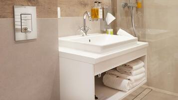 Shower, hydromassage showerhead, designer toiletries, hair dryer