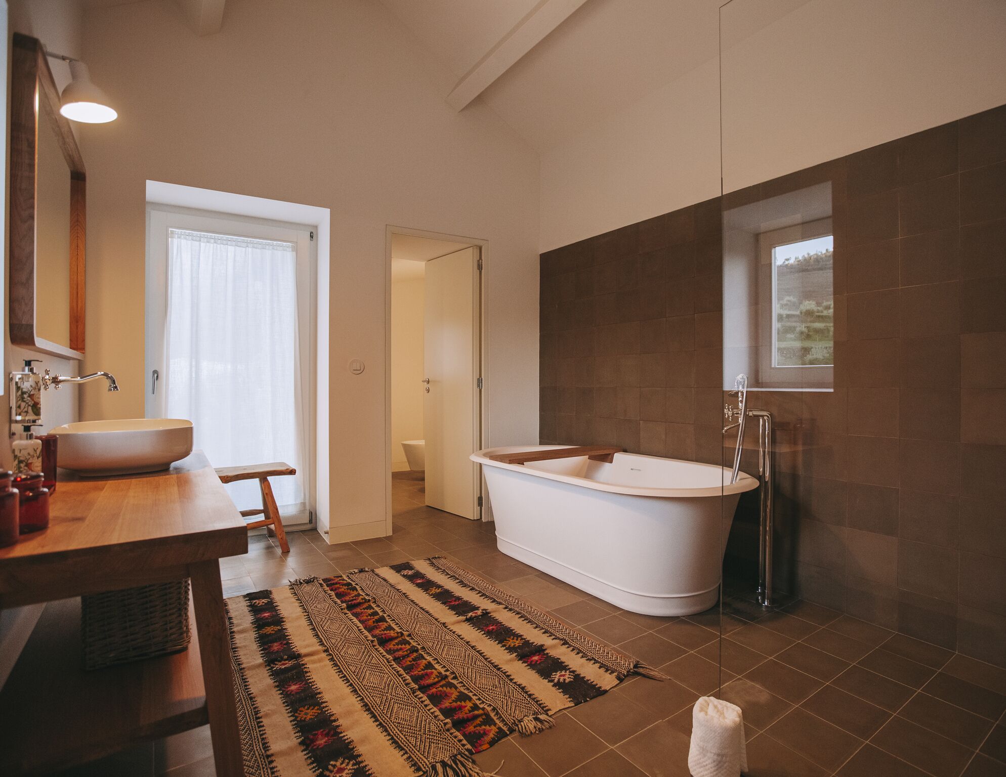 junior suite | bathroom | hair dryer, bathrobes, slippers, towels