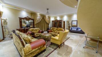 54-inch flat-screen TV with satellite channels, TV