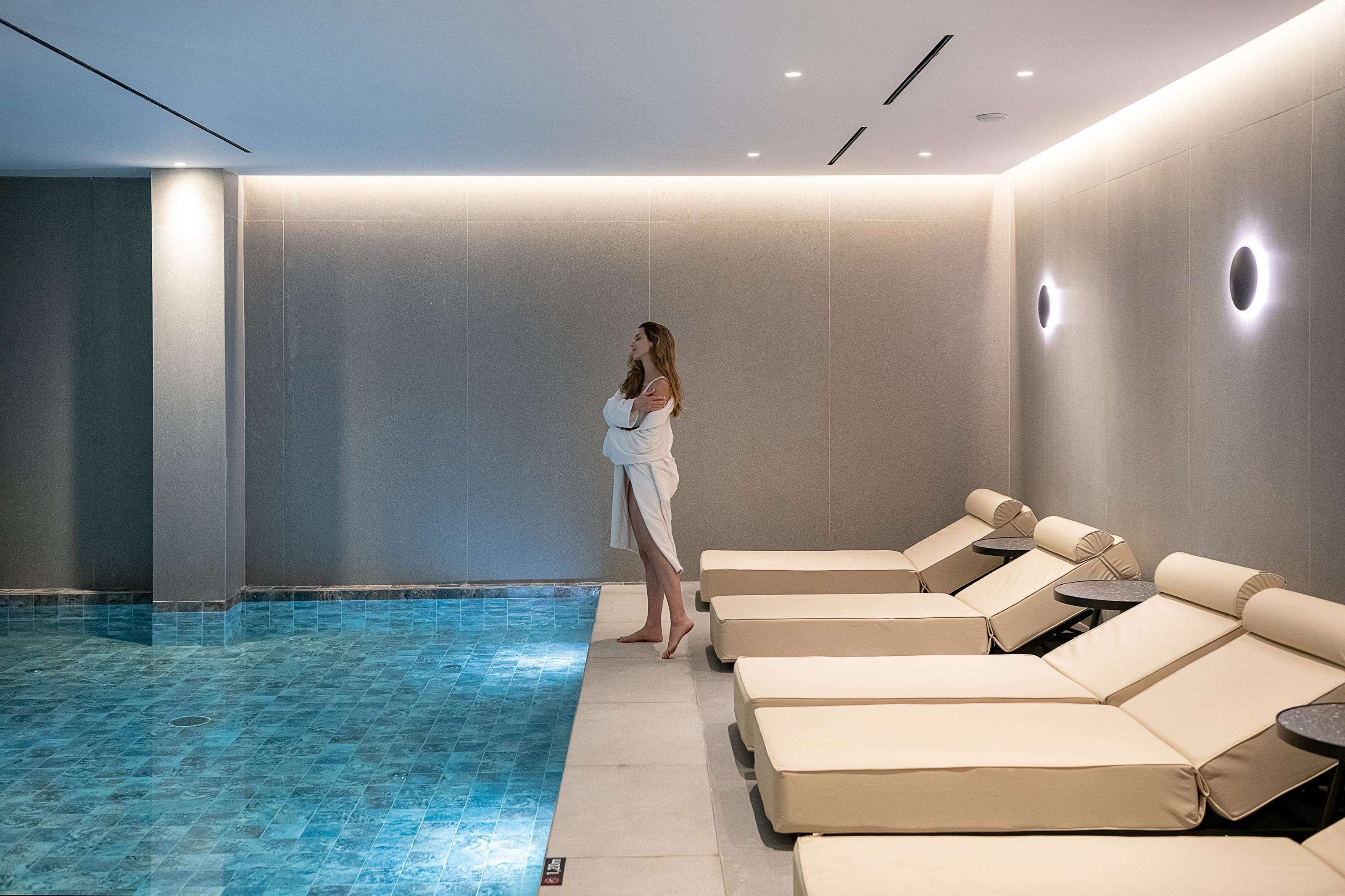 indoor pool, outdoor pool, pool umbrellas, pool loungers