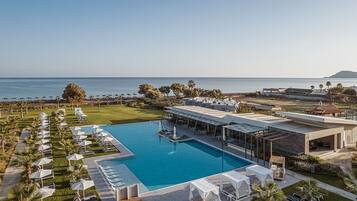 On the beach, sun loungers, beach umbrellas, beach towels