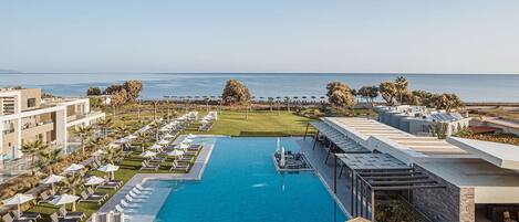 Indoor pool, outdoor pool, pool umbrellas, pool loungers