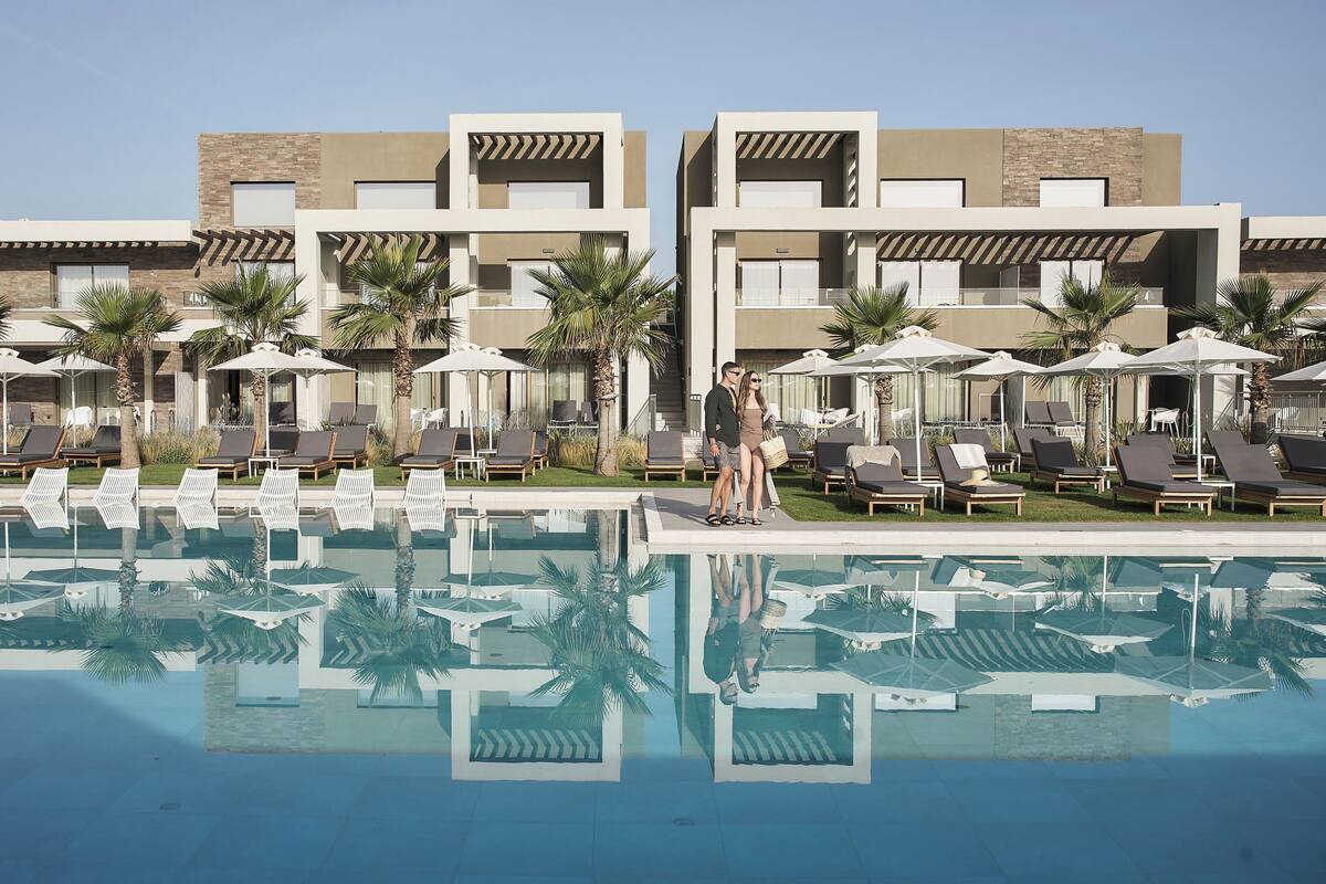 indoor pool, outdoor pool, pool umbrellas, pool loungers