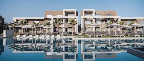 Indoor pool, outdoor pool, pool umbrellas, sun loungers