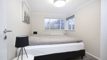 Apartment, 1 Bedroom | Laptop workspace, iron/ironing board, free WiFi, bed sheets