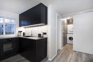 Apartment, 1 Bedroom | Private kitchen | Fridge, oven, stovetop, coffee/tea maker