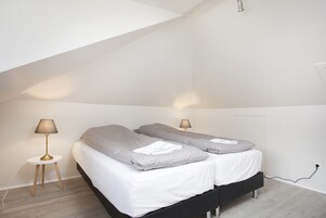 Apartment, 2 Bedrooms | Laptop workspace, iron/ironing board, free WiFi, bed sheets