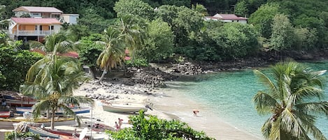 On the beach, sun-loungers