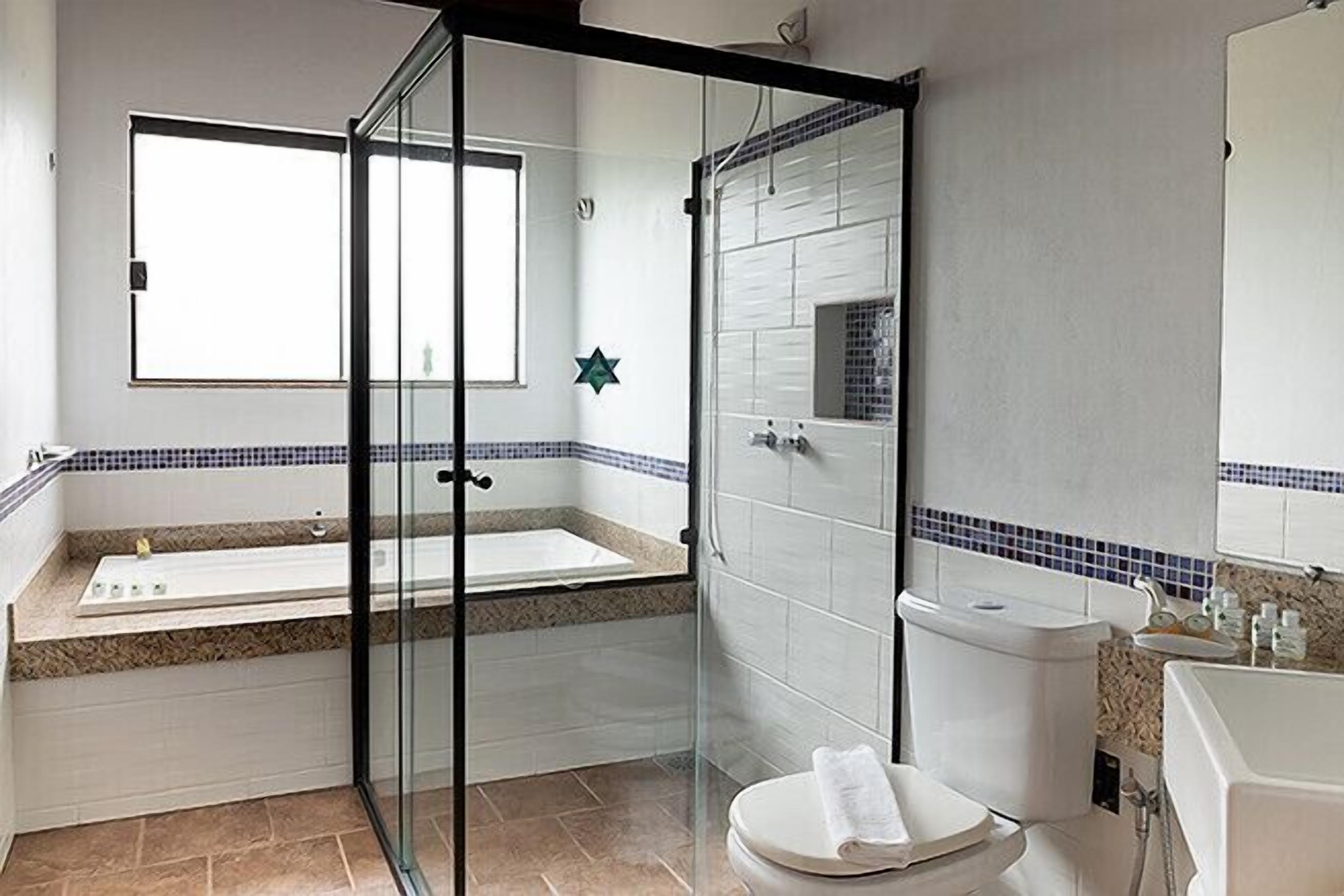 Luxury Suite (Super) | Bathroom | Shower, towels, soap, toilet paper