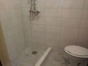 Family Room (Family room with shower) | Bathroom | Shower, towels, soap, toilet paper - Rooms Svitlana (Sukosan)