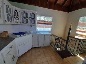 Executive Suite, 1 King Bed (Room 5) | Private kitchen | Shared fridge, microwave