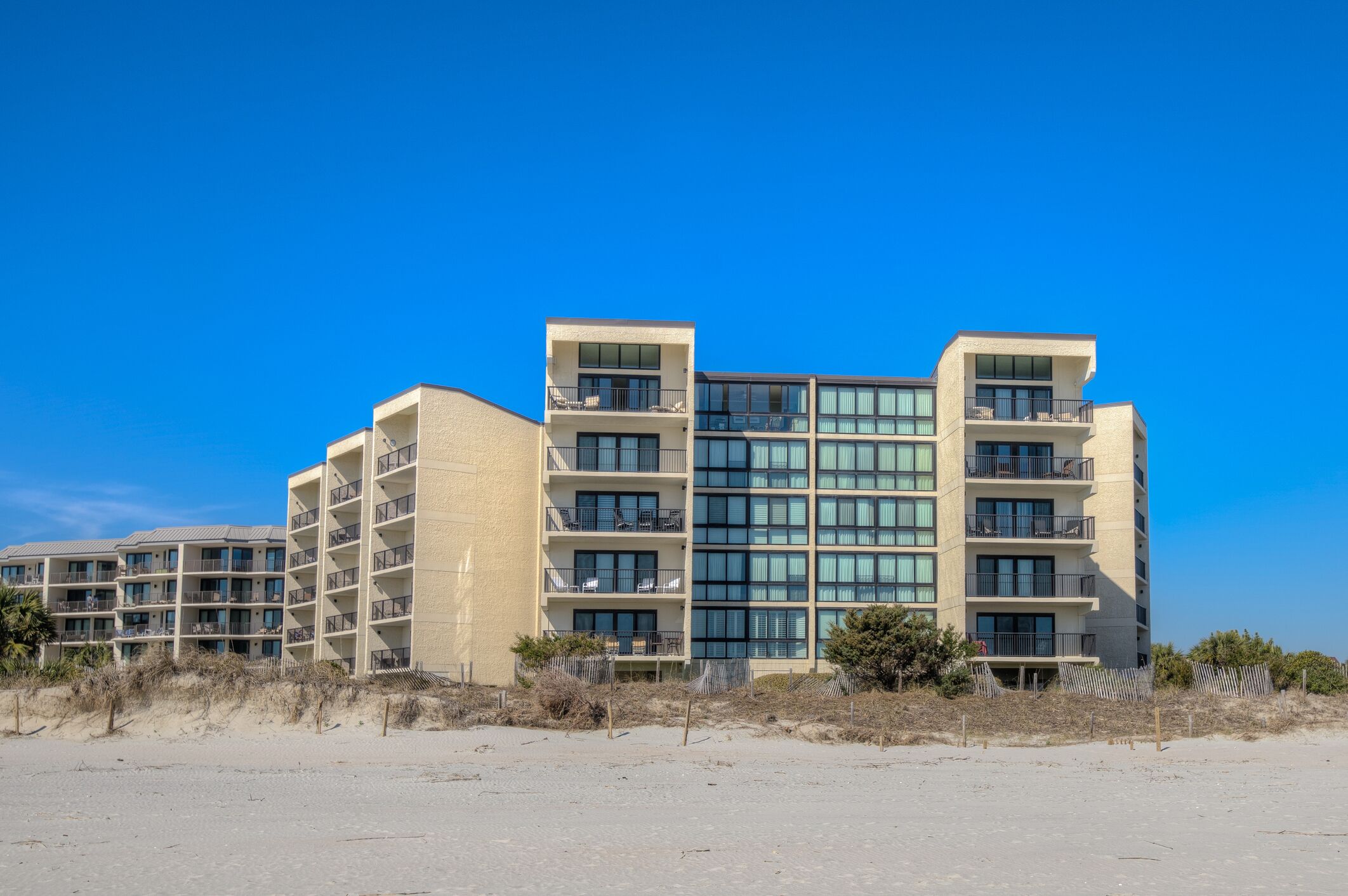 Oceanfront condo in gated Pawleys Island community with many amenities.