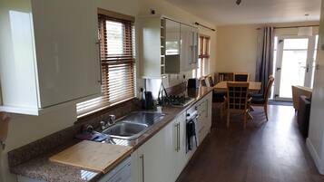 Family Chalet, 2 Bedrooms | Private kitchen | Cleaning supplies