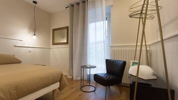 Desk, blackout curtains, soundproofing, iron/ironing board