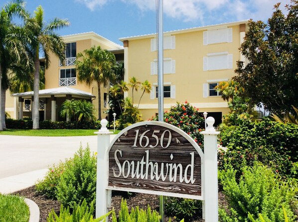 A sign with the number 1650 and the word 'Southwind' indicating the address.