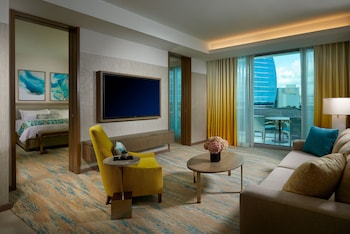 Platinum Suite King Balcony | 1 bedroom, premium bedding, in-room safe, desk at The Oasis Tower at Seminole Hard Rock