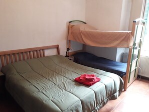 Quadruple Room, Shared Bathroom | Blackout curtains, iron/ironing board, free WiFi, bed sheets