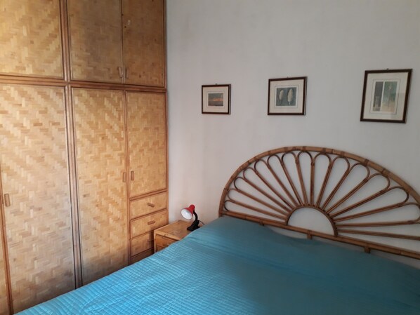 Triple Room, Shared Bathroom | Blackout curtains, iron/ironing board, free WiFi, bed sheets