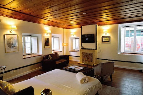 Suite, Balcony | Minibar, desk, laptop workspace, blackout drapes