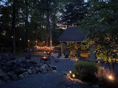Cottage style cabin, pet friendly, on 4 wooded acres. Sleeps 6-12 people. 