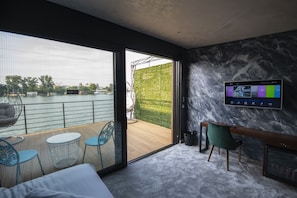 Apartamento (A3) | Zona de estar | Una televisión LED