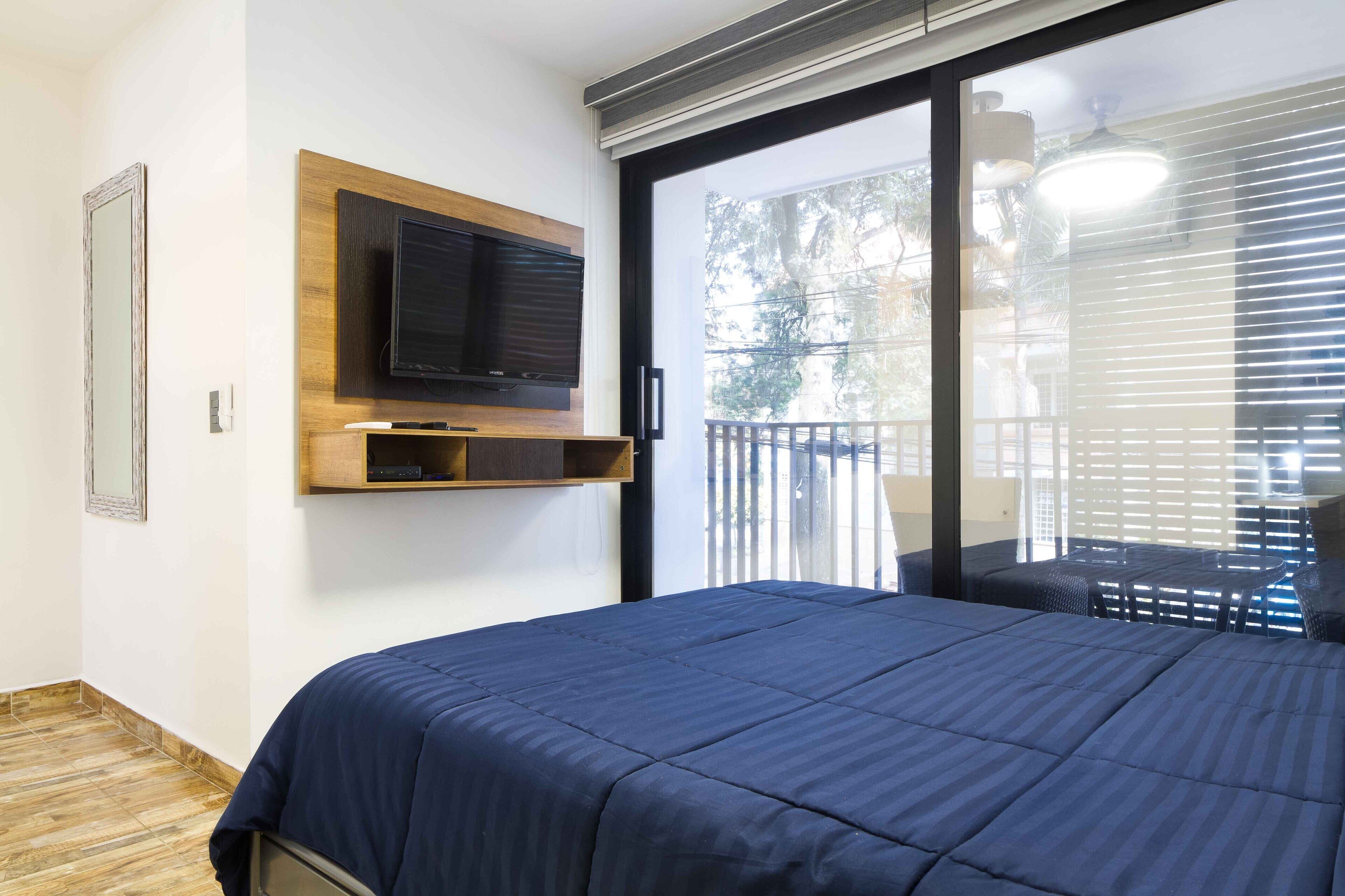 Balcón de dos habitaciones AC Bañera de hidromasaje Tiempo parcial Portero Poblado