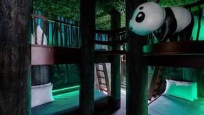 A treehouse-style room with bunk beds and a large panda statue. - Feature-Rich Home Near Disney w Treehouse & Superhero BRs, Theater, Arcade, & Ga (Kissimmee)