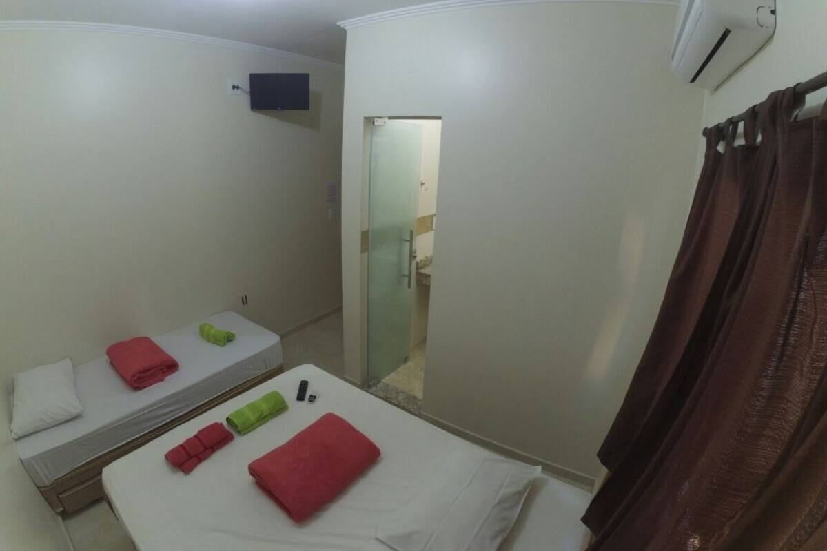 Chambre Triple | Minibar, fer et planche à repasser, Wi-Fi gratuit, draps fournis