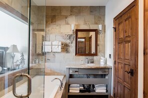 Bathtub, hair dryer, towels