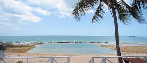 On the beach, sun-loungers, beach towels