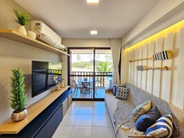 Classic Apartment | Living area | 32-inch Smart TV with satellite channels, TV